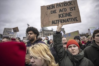 150, 000 people gather around the Bundestag in Berlin to build a human wall against the shift to