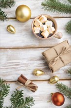 Christmas or New Year composition. Decorations, box, golden balls, cinnamon, fir and spruce