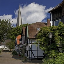 The old town centre with half-timbered houses and the church tower of Sankt Viktor, Schwerte, Ruhr