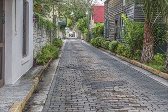 Residential brick paved street in the historic district of downtown St. Augustine, Florida, USA,