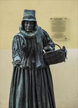 Sculpture of woman in front of city hall, center of village Lenzen, Germany, Europe