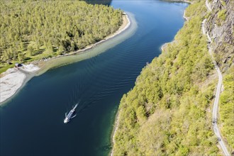 Aerial view of lake Lovatnet (or: Loenvatnet), local cruise ship on its way to Kjenndalstova,