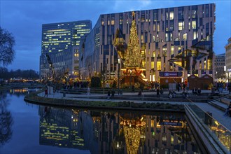 Christmas market, at the Kö-Bogen shopping centre, in the city centre of Düsseldorf, at the back