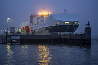 Thick fog in winter, hanging over the mouth of the Elbe into the North Sea, DFDS ferry Britannia