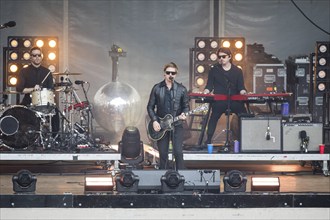 Samuel Sam Fogarino (drummer), Paul Banks (singer) and Brandon Curtis (keyboarder) of the band