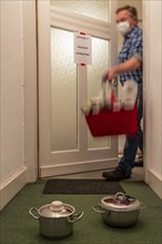 Symbolic image Domestic quarantine, man is in isolation at home due to a suspected corona