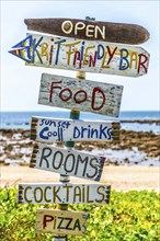 Signpost to a beach restaurant, hint, board, signpost, info, information, design, food, restaurant,