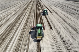 Aerial view, tractors sowing sunflower seeds, Thyrow, 21.04.2023