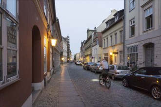 A street illuminated with lanterns in the old town of Stralsund, 12/09/2016