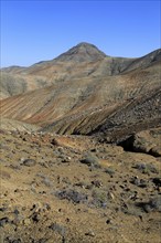 Bare moon-like arid landscape in mountains between Pajara and La Pared, Fuerteventura, Canary