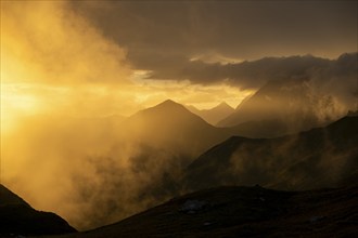 Montafon mountains with dramatic cloudy sky at sunset, Tschagguns, Rätikon, Montafon, Vorarlberg,