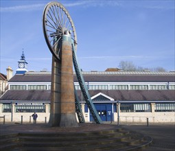 Old winding wheel memorial to the coal mining heritage of the Somerset coalfield, Radstock,