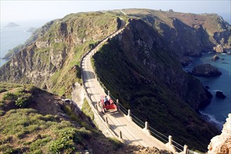 La Coupee narrow track between Sark and Little Sark, Island of Sark, Channel Islands, Great Britain