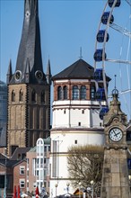 Rhine promenade in Düsseldorf, Ferris wheel, old castle tower, St Lambert's Basilica, old town,