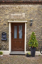 Entrance of a brick house with Easter decoration in Warendorf, district of Warendorf, North