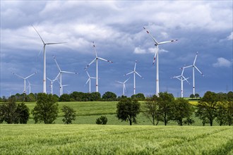 Wind farm east of Geilenkirchen, dark storm clouds, strong wind, North Rhine-Westphalia, Germany,