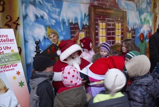 Europe, Germany, Bremen, Christmas market, St Nicholas reading to children, Hamburg, Hamburg,