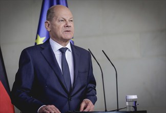 Olaf Scholz, Federal Chancellor, speaks at a press conference during the visit of Denis Becirovic,