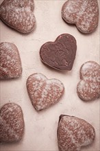 Food wallpaper, chocolate glazed gingerbread, heart-shaped, top view, no people