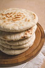 Pita bread, stack, on the table, no people