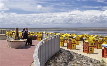 Beach promenade with beach chairs on the Wadden Sea in the district of Duhnen, North Sea spa town