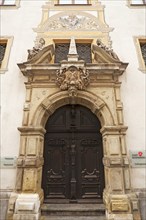 Entrance portal with the alegories of Faith and Peace from the Baroque town hall from 1661,