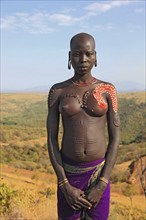 South Ethiopia, in the Maco National Park, woman from the Mursi tribe, Mursi woman with naked upper