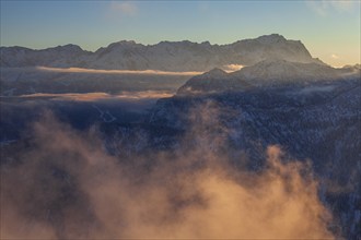 Mountain peak in winter, evening light, snow, view from the Laber to the Zugspitze, Ammergau Alps,