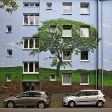 Residential buildings with a landscape mural after renovation, Bochum-Hamme, Ruhr area, North