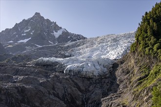 Impressive mountain landscape with glacier, glacier tongue of the Glacier des Bossons and summit of