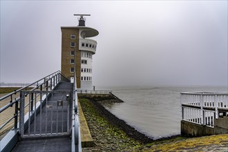 Thick fog in winter, hangs over the mouth of the Elbe into the North Sea, radar tower of the Water