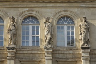 Three sculptures at the opera built in 1862, theatre, house facade with two windows, Toulon, Var,