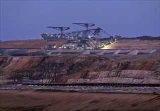 Lignite excavators extract coal in the Welzow open-cast mine, operated by LEAG. The lignite is