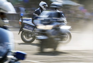 Berlin police officers from the motorbike squadron during a column ride at the Berlin police open