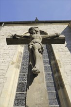 Jesus Christ on the cross in front of the parish church of St Christophorus, Werne, North