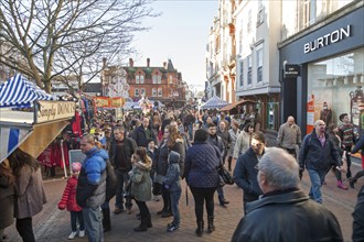 Crowds of people Christmas shopping in town centre of Ipswich, Suffolk, England, UK