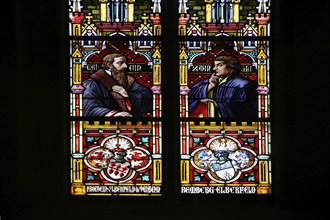 Colourful stained glass window with reformers Johannes Calvin and Huldrych Zwingli, stained glass,