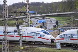 ICE train on the railway line at the Kaiserberg motorway junction, the A3 and A40, 8 tracks run