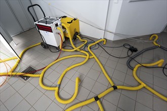 Water damage restoration, dehumidification, after flooding of a building, vacuum drying