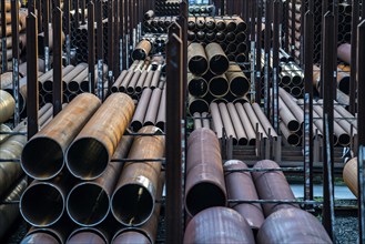 Warehouse for steel pipes in Duisburg harbour, steel pipes in various diameters, North