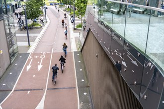 Entrance and exit of the bicycle car park at Utrecht Centraal station, Stationsplein, over 13, 000