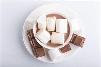 A cup of hot cocoa with marshmallow and milk chocolate isolated on white.isolated on white, closeup