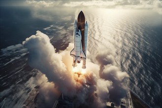 Aerial view of a rocket shuttle carrier launch at sunrise over an ocean coast. The rocket is