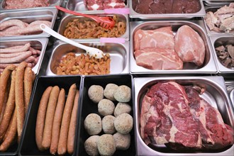 Variety of fine meat products in the butchery (Variety of fine meat products in the butchery)