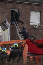 2nd day of the eviction of the Lützerath hamlet, occupied buildings of the former farm, by climate