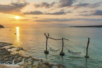 Hammock in the sea water in front of the holiday island Nusa Lembongan, beach, beach holiday, beach