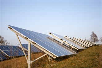 Solar array of photovoltaic panels in countryside at Bromeswell, Suffolk, England, United Kingdom,