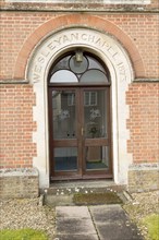 Doorway to Wesleyan Chapel building dated 1873 large village of Pewsey, Wiltshire, England, UK