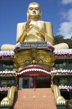 Giant Golden Buddha statue at Dambulla cave temple complex, Sri Lanka, Asia