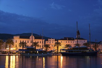 Trogir is a port city in Croatia and is located in central Dalmatia about 15 kilometres west of